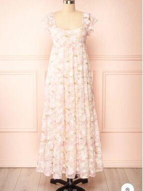Storia Flowered dress size small with open bow back